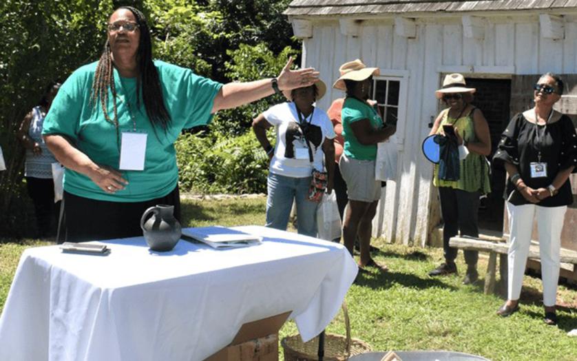 Historic Sotterley Board Vice President, Gwen Bankins, addressing visitors during 2022's Day of Unity and Healing event