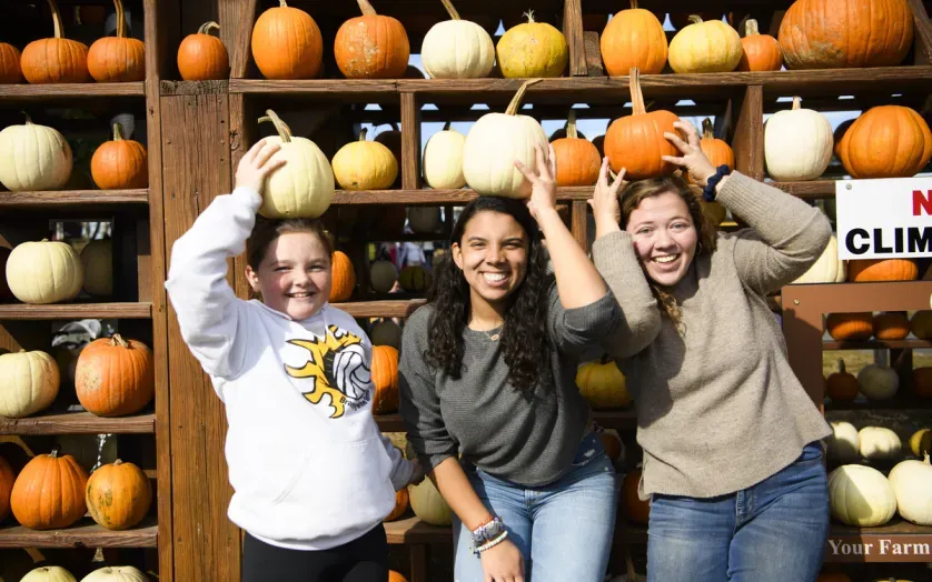 Friends with Pumpkins at Milburn Orchards