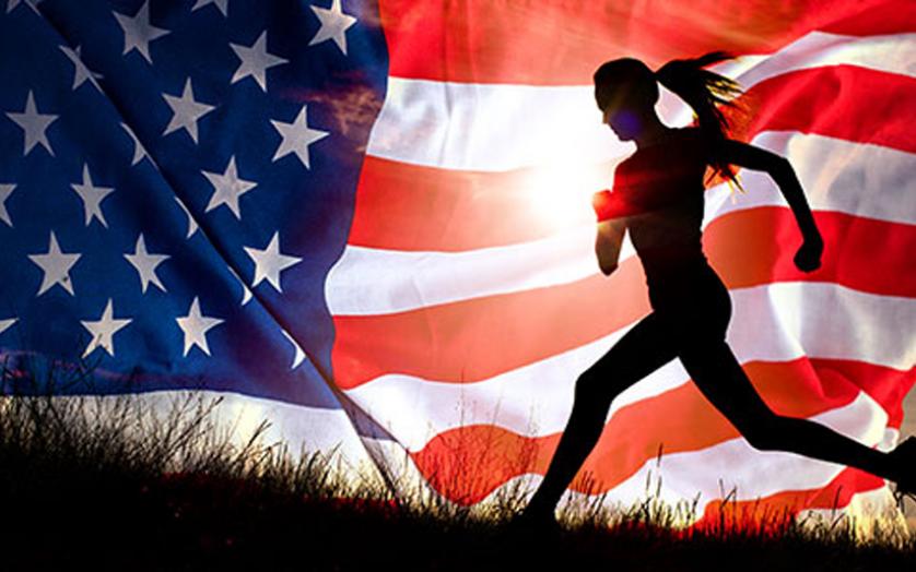 A picture of an American Flag and a female runner in a black sillouette.