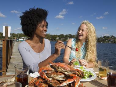 Women enjoying crabs
