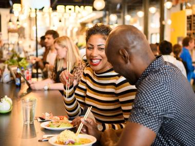 A couple enjoying eating together