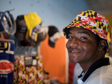 young boy with Maryland flag hat