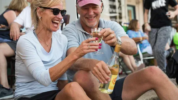 A couple enjoying a glass of wine together.