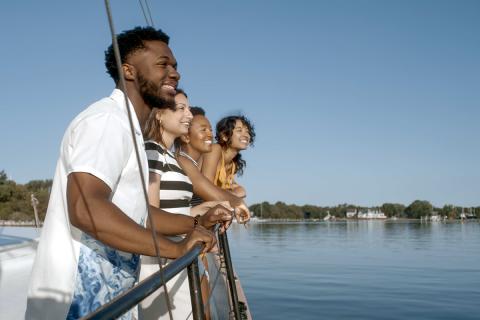 Friends enjoying a beautiful scenic boat ride on the Chesapeake Bay
