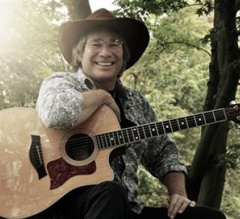 Ted Vigil holding guitar Photo