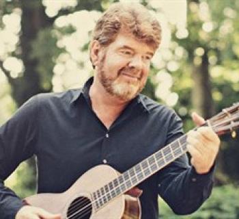 Mac McAnally playing guitar Photo