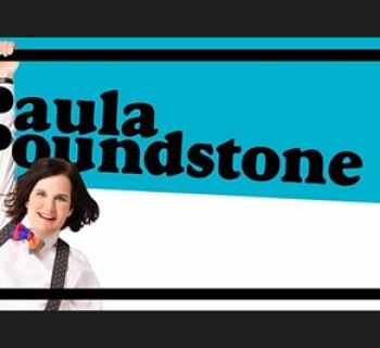 Paula Poundstone wearing her signature suspenders Photo