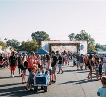 People at an outdoor festival Photo