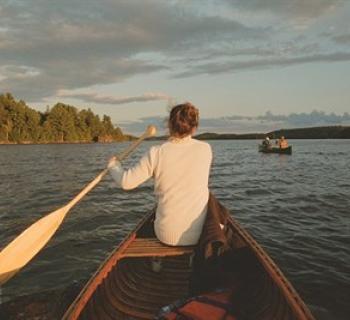 Woman in canoe on Ahmic Lake Photo