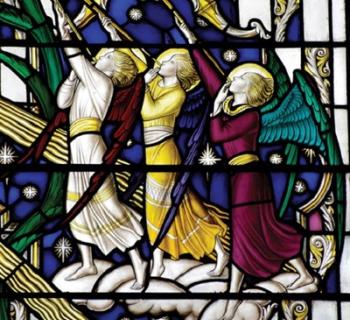 Stained glass angels with trumpets  Photo