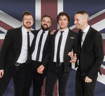 4 Men standing in front of British flag background Photo