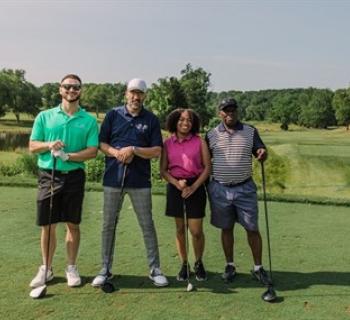 All smiles at Swing Into Action for Kids! Photo