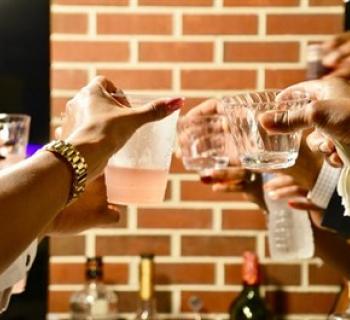 Men and women socializing Photo