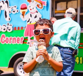 A child eating ice cream. Photo