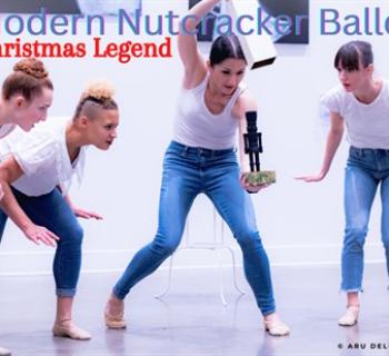 Dancers looking at the statue of Modern Nutcracker - surprised and excited Photo