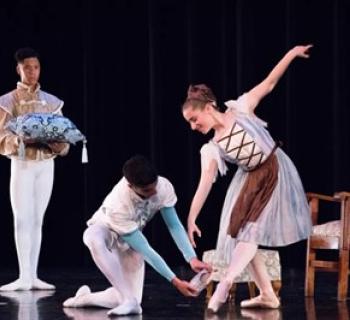 The Prince tries the glass slipper on Cinderella Photo