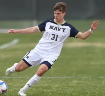 Player kicking ball Photo