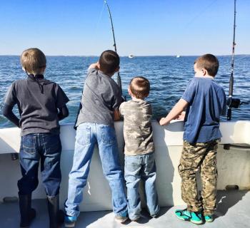 Young fishermen enjoy the waters off Tilghman Island. Photo