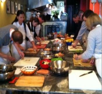 People cooking at Pierpoint Cooking Class. Photo