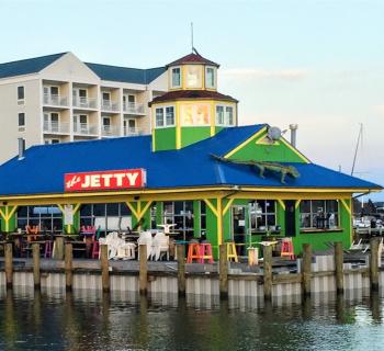 Exterior from the water of The Jetty: Restaurant and Dock Bar Photo