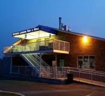 Brewer's Landing Bar and Grill exterior night view Photo