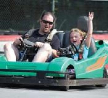 Father and son go-karting at Grand Prix Amusements Photo