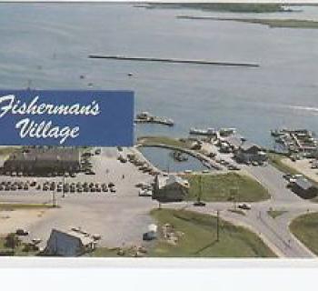 Arial view of Fisherman's Village which includes marina Photo