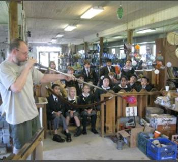 Man glass blowing Photo