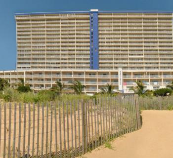 Beach view of Carousel Oceanfront Hotel and Condominiums Photo