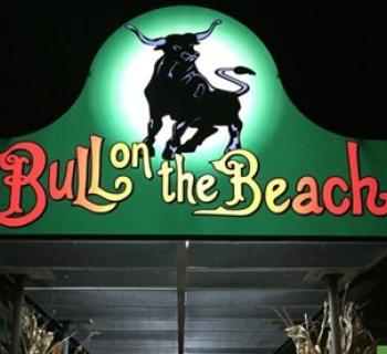 Bull on the Beach sign over the doors beckons diners Photo
