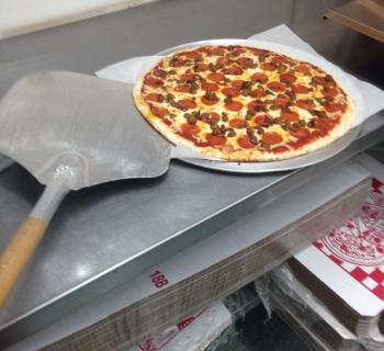 Freshly made pizza.  Photot Photo