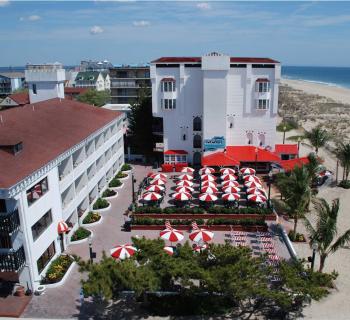 Aerial View of Coconut's Bar & Grill  beach & oceanfront patio. Photo