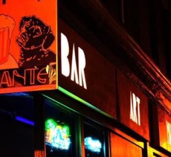 Dant's Bar, Art, Music sign lights up the night. Photo