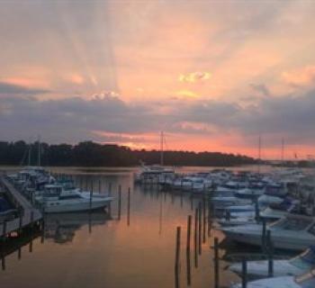 sunset over the water Photo