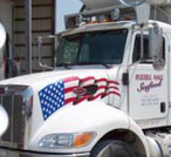 A refrigerated truck gets ready to deliver fresh seafood. Photo