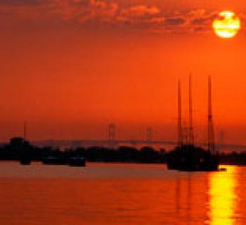 sunset on the water photo Photo