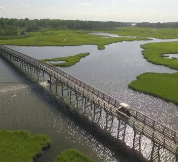 Picture of a crossing bridge at the Lighthouse Sound Golf Course Photo