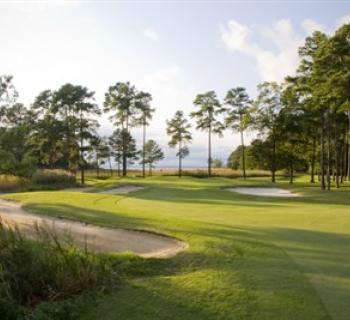Picture of a fairway and sand traps at the Swan Point Yacht & Country Club Photo