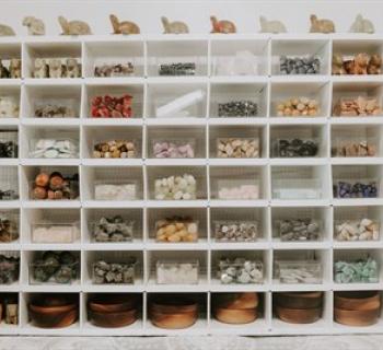 Crystals displayed on shelf Photo