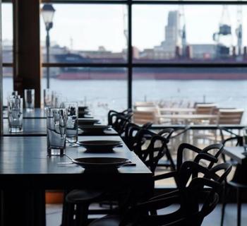 Waterfront view dining area at Ampersea Restaurant Photo
