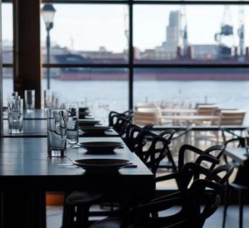Waterfront view dining area at Ampersea Restaurant Photo