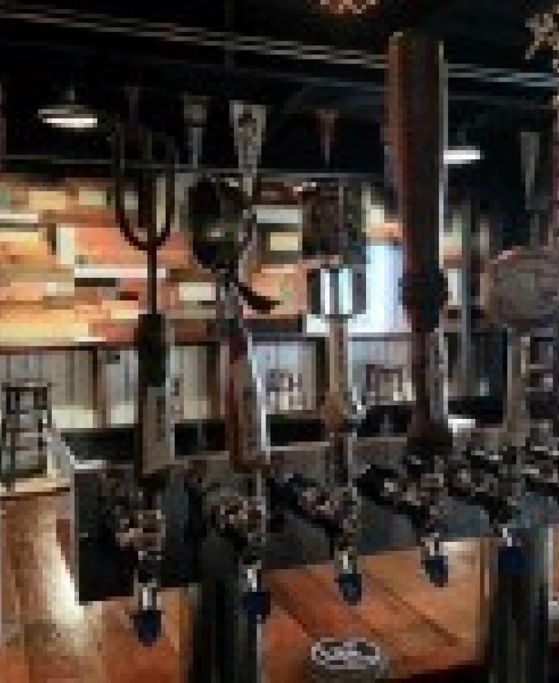 Beer taps at the bar of Waverly Brewing Company Photo
