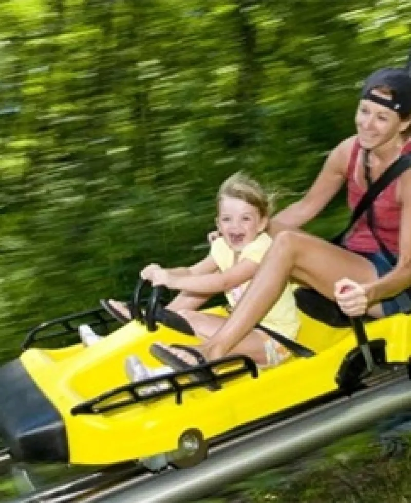 Woman and girl on Mountain Coaster at Wisp Photo