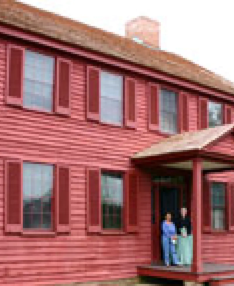 Photo of a red house Photo