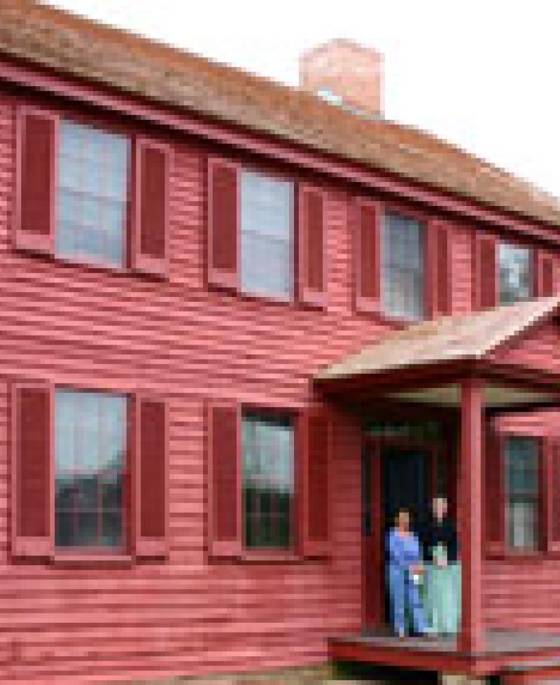 Photo of a red house Photo