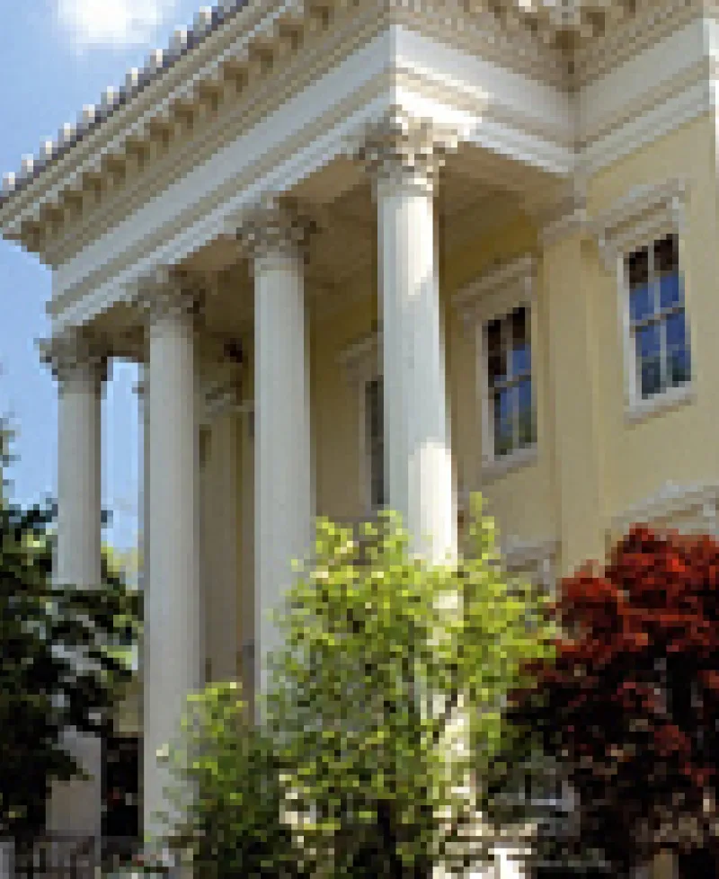 Yellow stucco house Photo