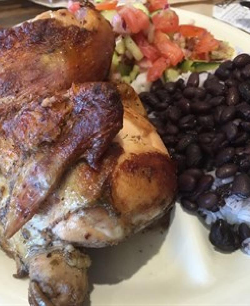 1/2 chicken with cucumber salad and rice-n-beans from Don Pollo Photo