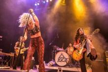 Lez Zeppelin performing on stage Photo