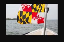 Boat with Maryland Flag Out on the Water Photo