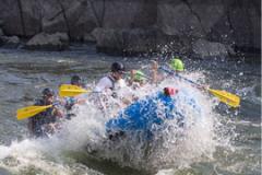 Image of people enjoying whitewater rafting
